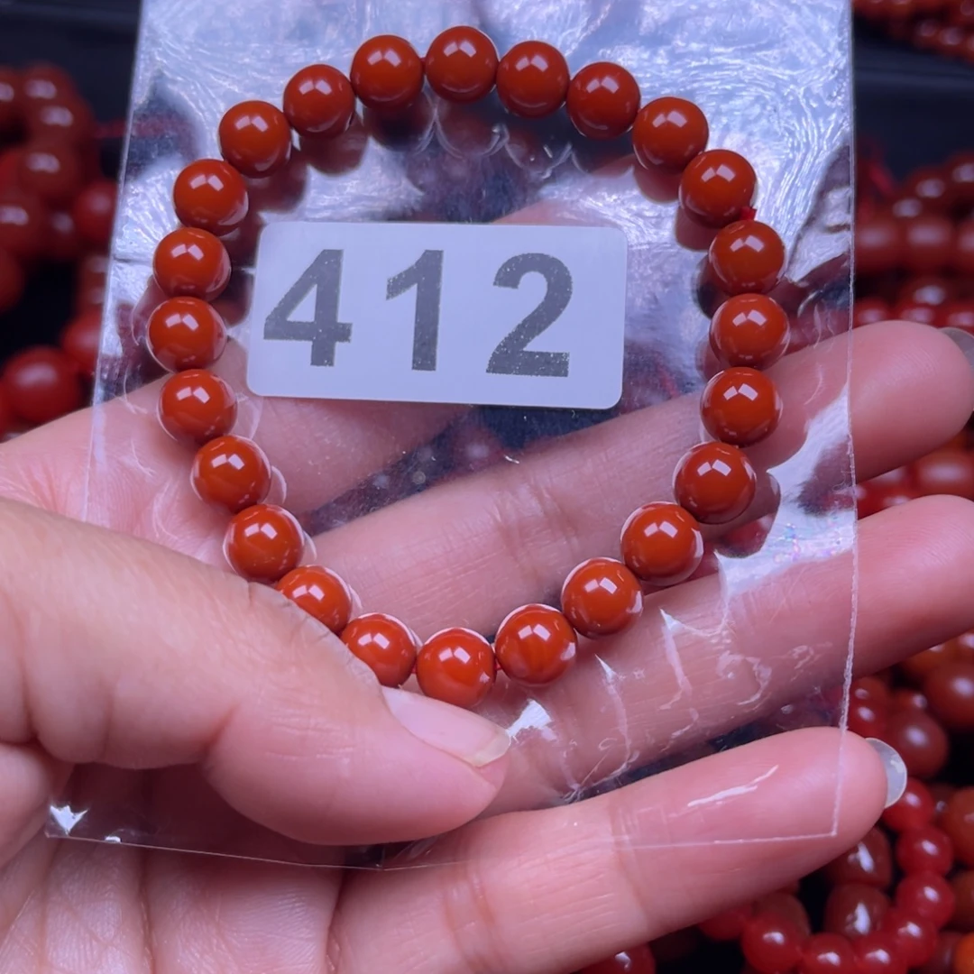 谁****南红玛瑙未镶嵌手链