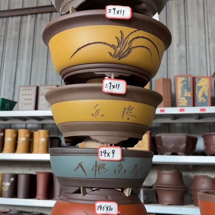 紫砂花盆100-6。