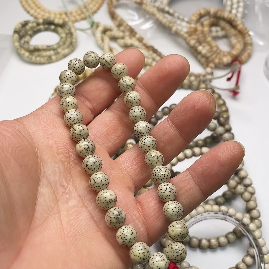 巴***乔星月菩提把件瓷料9圆手持