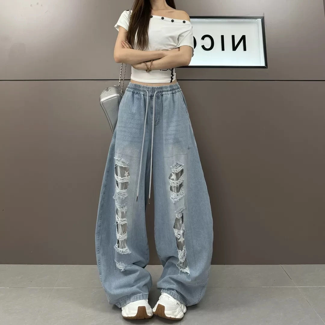 美式潮牌蓝色牛仔贴布破洞跳舞长裤设计牛仔破洞裤女