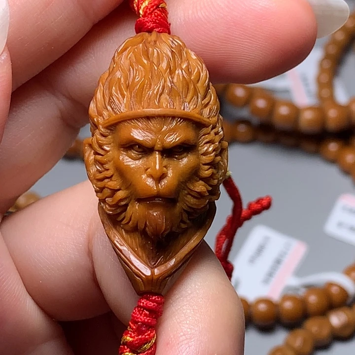 浙***划手串橄榄核斗战胜佛