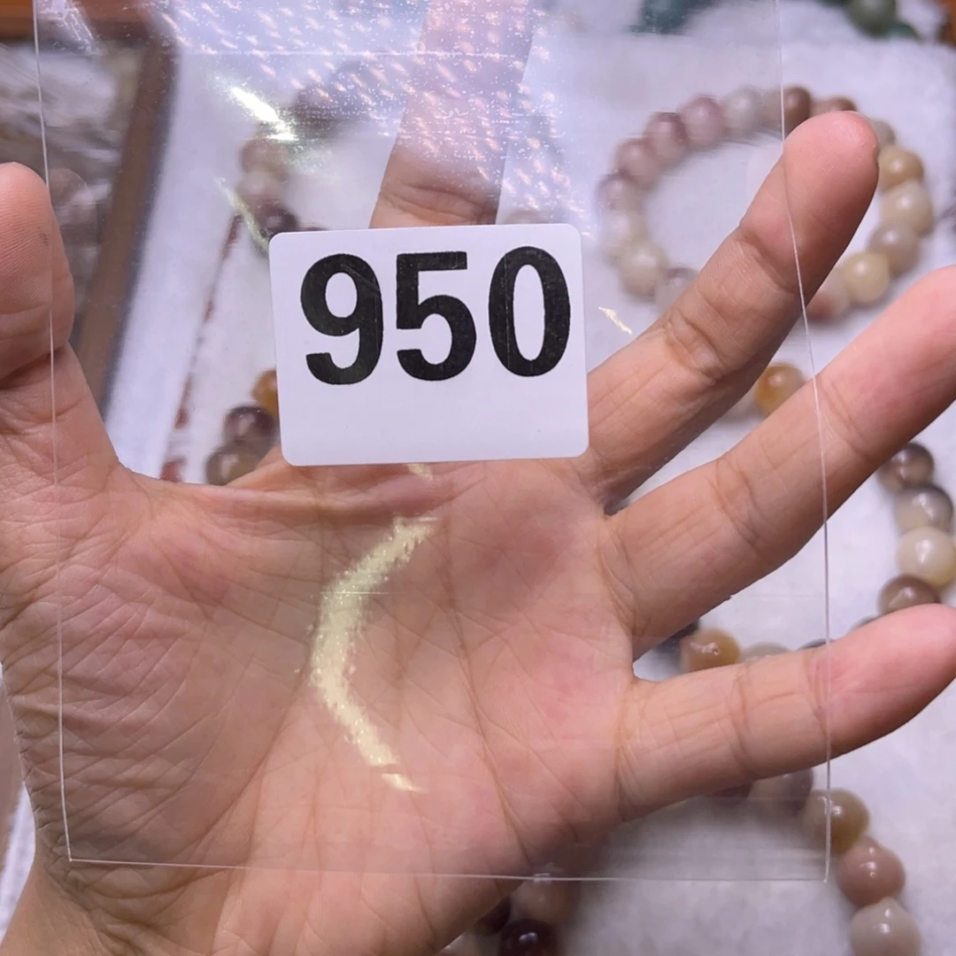 郁****手串菩提根/象牙果950