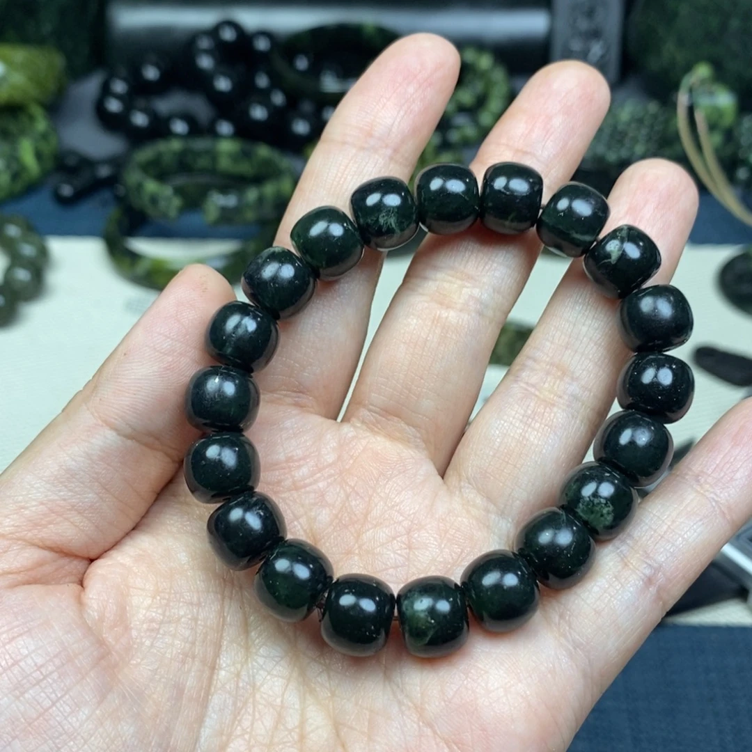 夕***奶蛇纹石玉未镶嵌手链