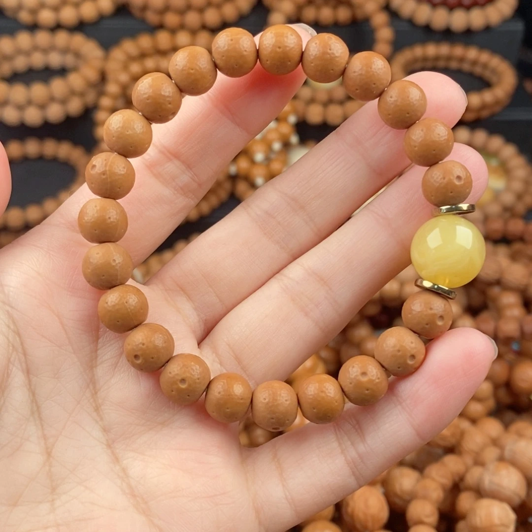 曹***浩猴头核桃手串二等陨石坑