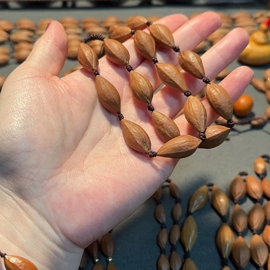 ****1.1小金瓜子手持16粒款