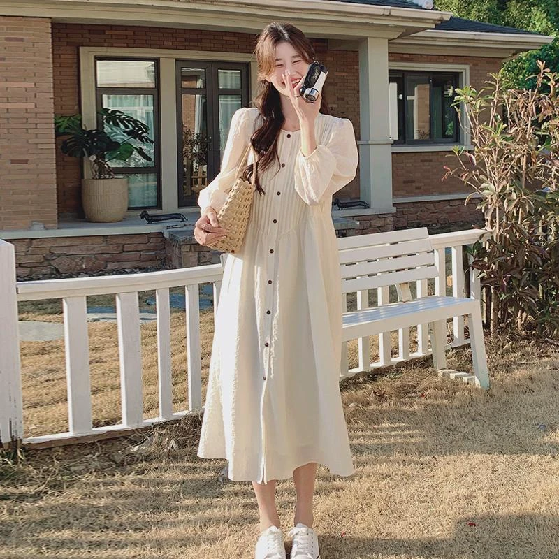 米白色绝美连衣裙女春夏2025新款茶歇法式衬衫裙别致独特