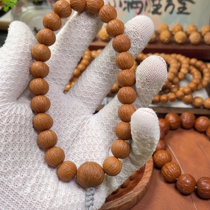 永***爱猴头核桃手串凤羽