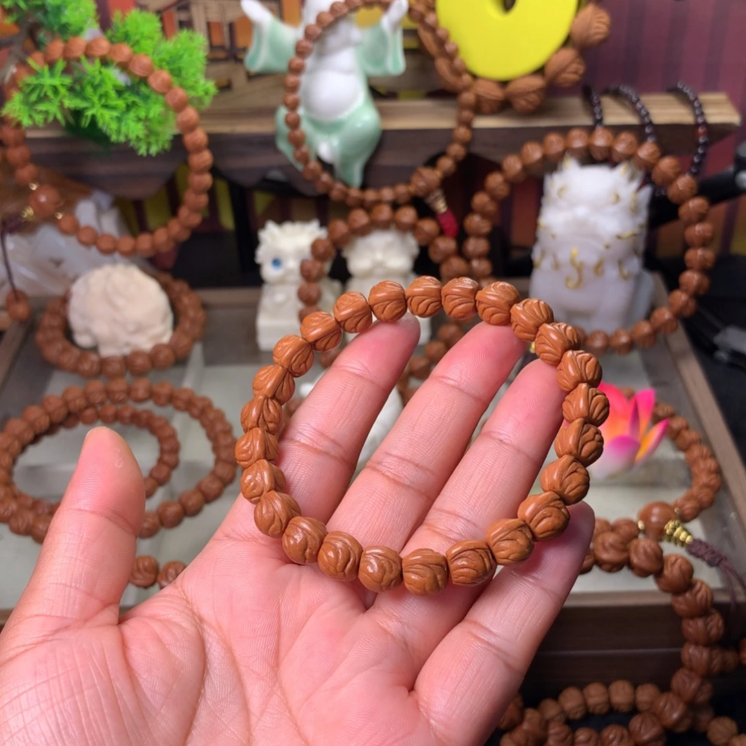 卒***桃核吊坠金玉龙手串10