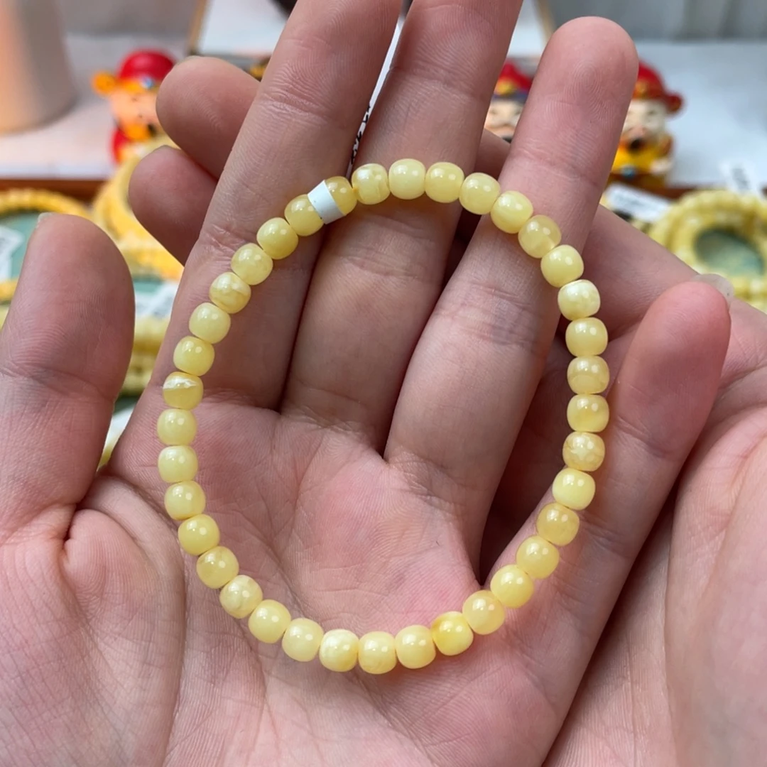 琥珀未镶嵌裸石黄妖花5.5