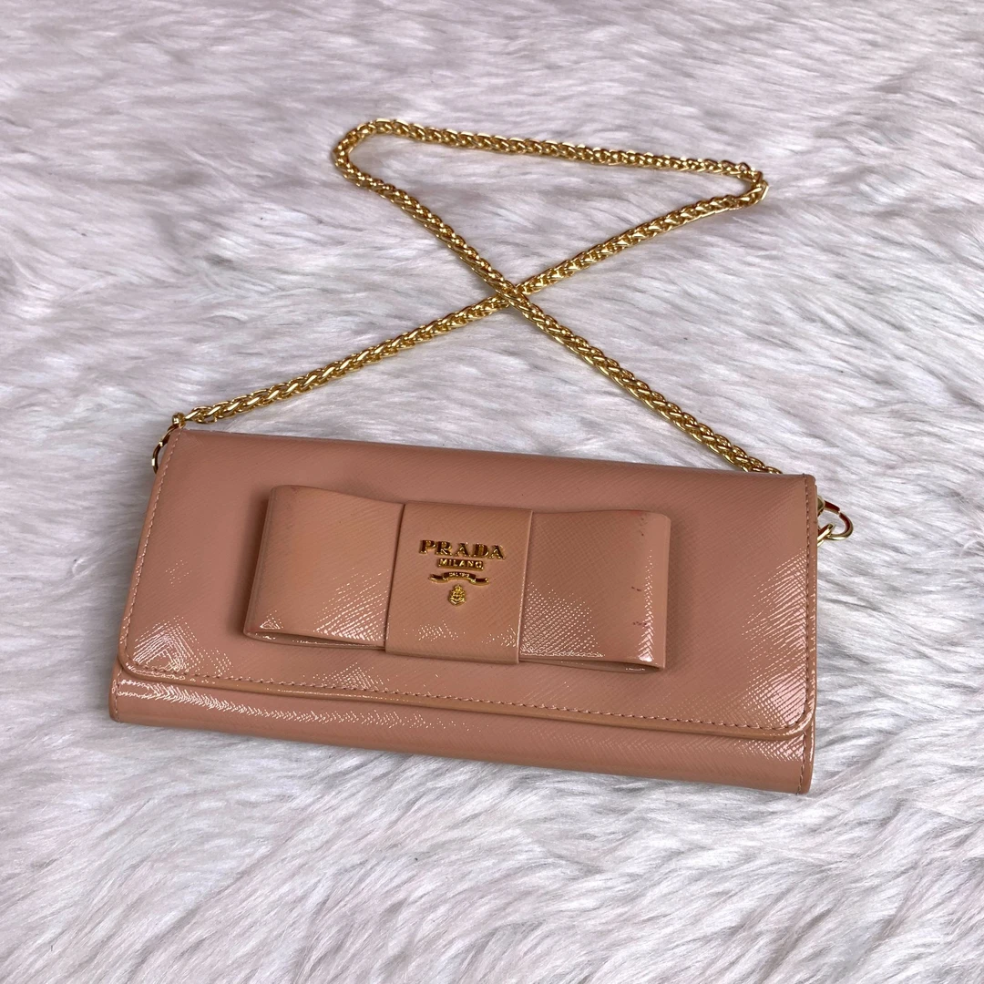 95新 Prada/普拉达 粉色蝴蝶结链条钱包/YW04303048/3048