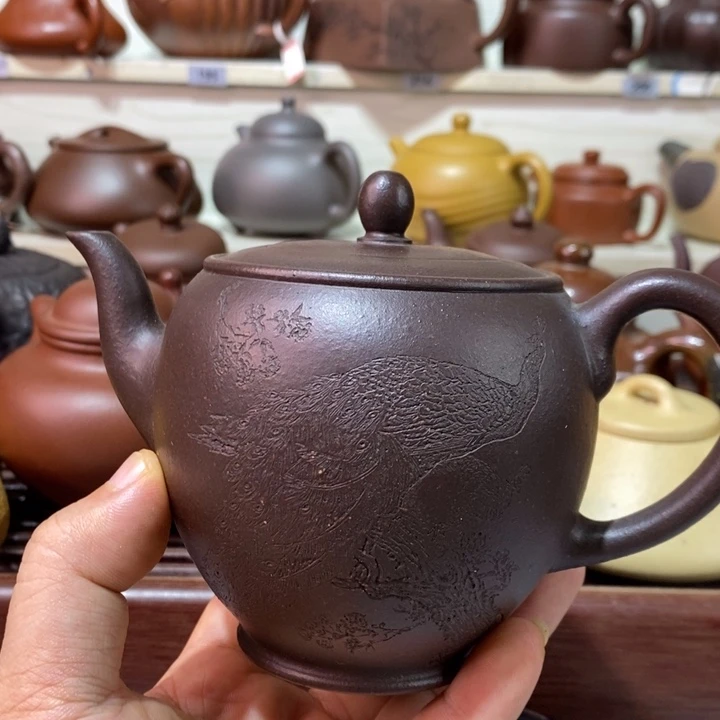 何***悟茶壶紫砂精工制作