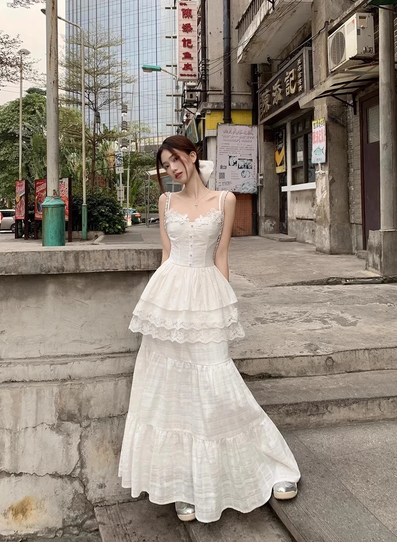 甜美套装设计感拼接吊带背心女夏季新款高腰a字半身裙度假两件套