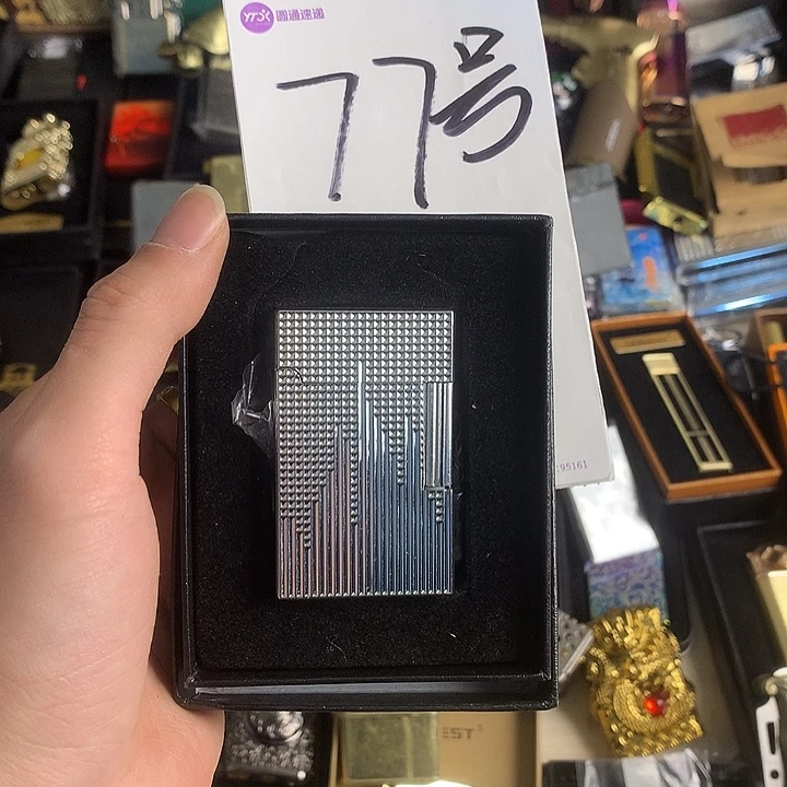 靓***仔77号郎声打火机一个