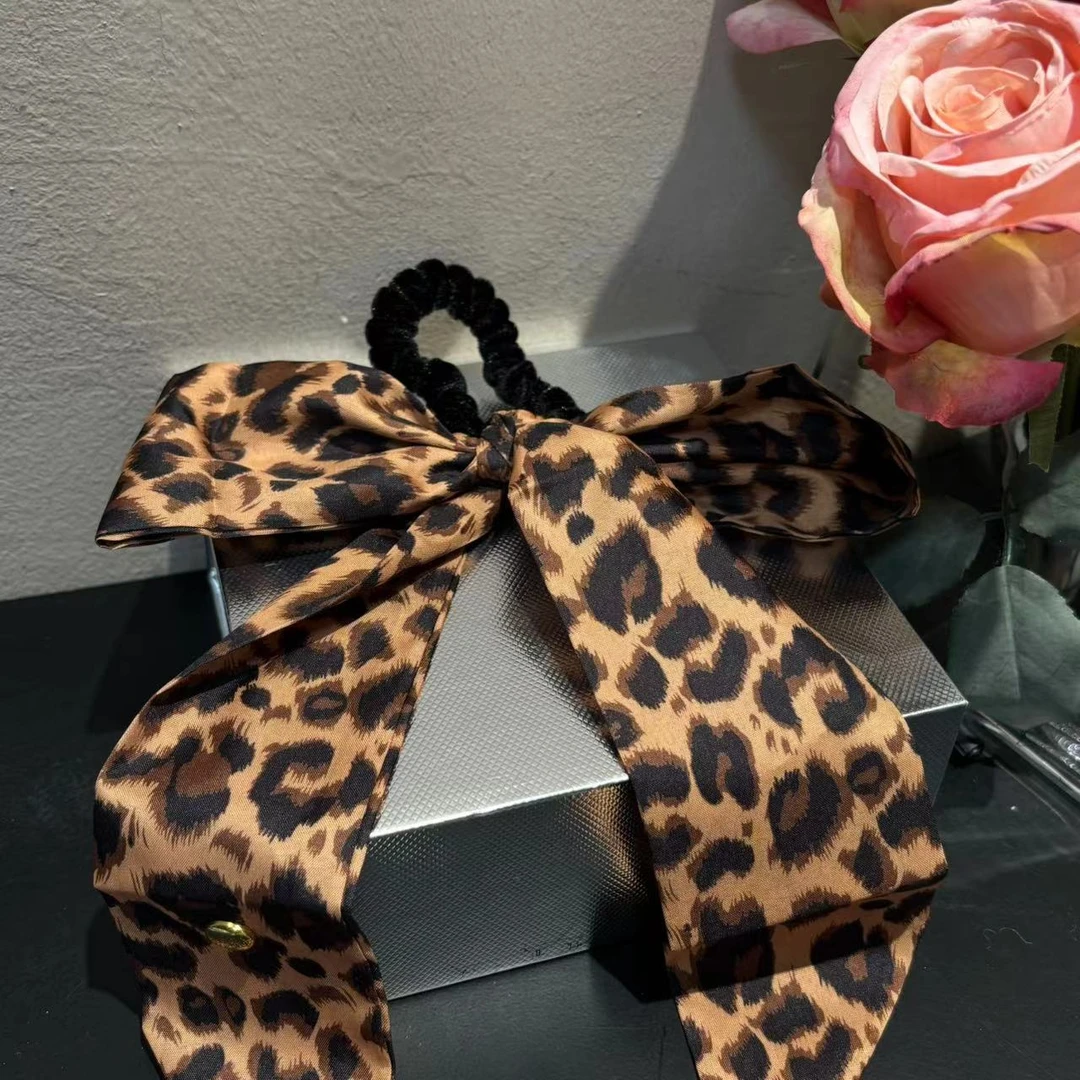 东大门设计款豹纹蝴蝶结发圈T807