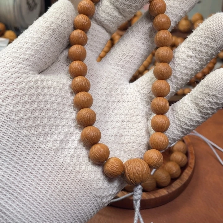 一***秋猴头核桃手串凤羽