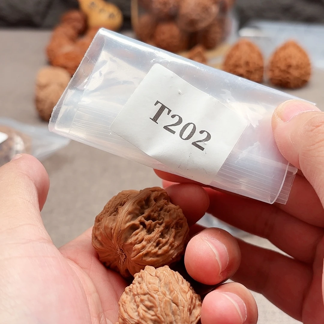 我***藏文玩核桃把件黄杆T202