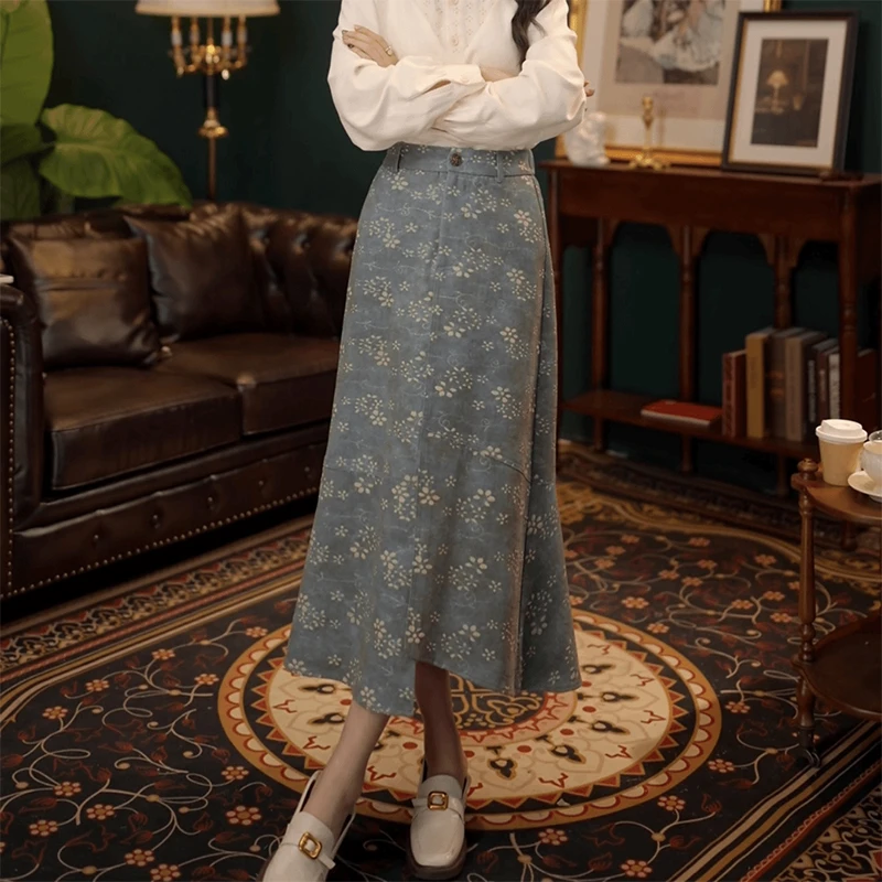 港风复古不规则碎花半身裙女春季新款设计感修身显瘦包臀中长裙子