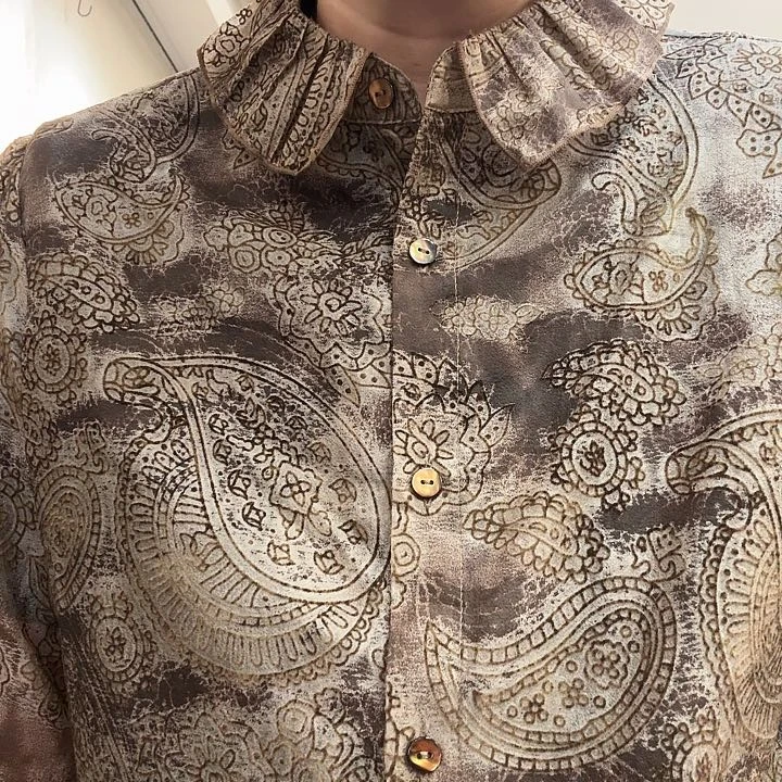 喻****35108，咖啡色，L码，上