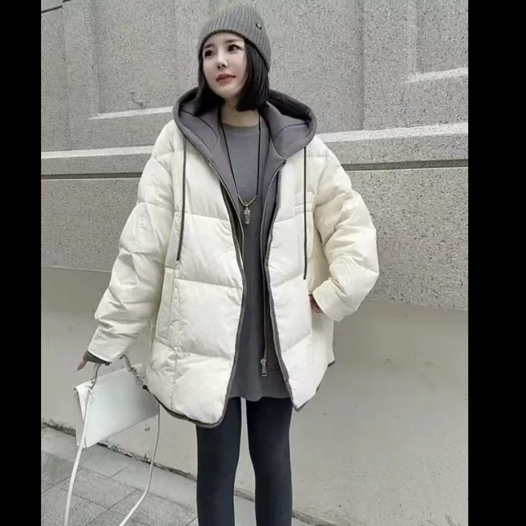 HGZ9325冬季新款韩版欧货中长款假两件卫衣连帽拼接羽绒服女