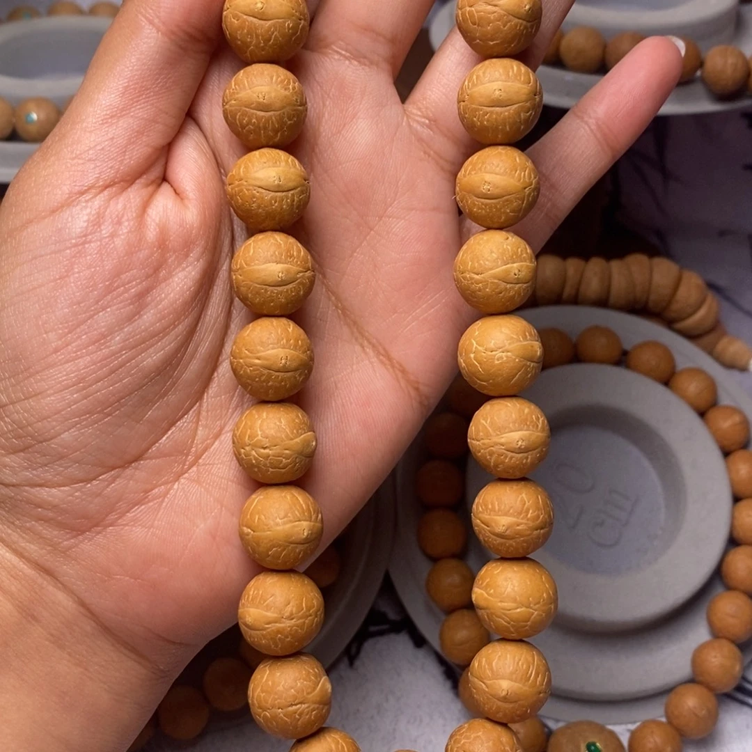 凤眼菩提吊坠手持