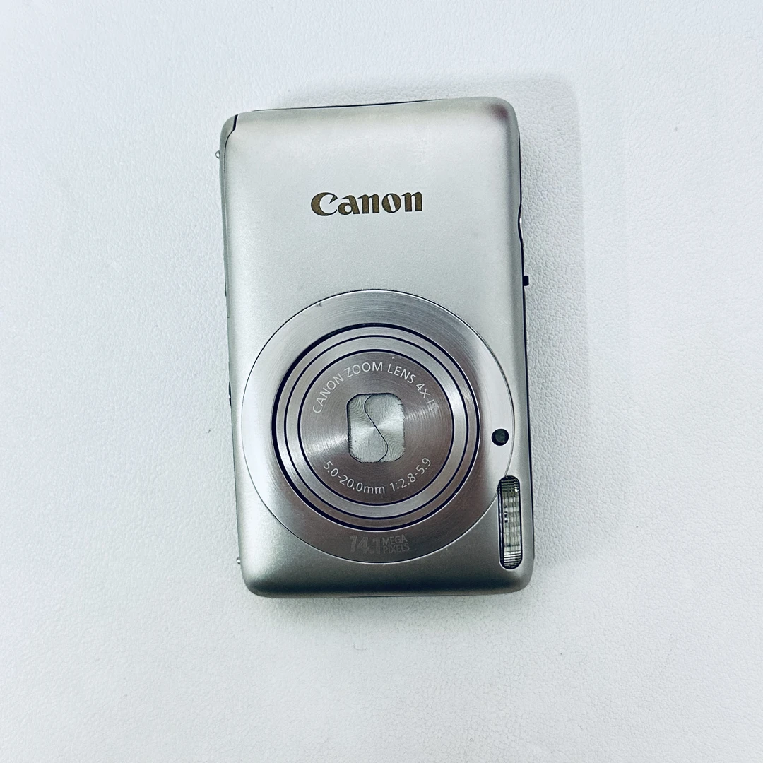 9新 Canon/佳能 ixus130银色1400w像素人像闭眼入16g大卡➕座充