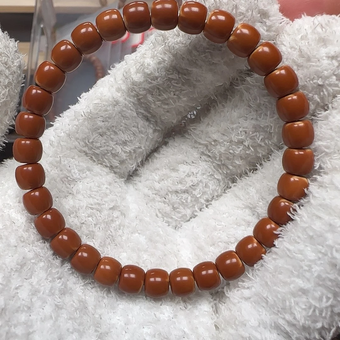 橄榄核吊坠老挝7.0mm三花极限弧单圈