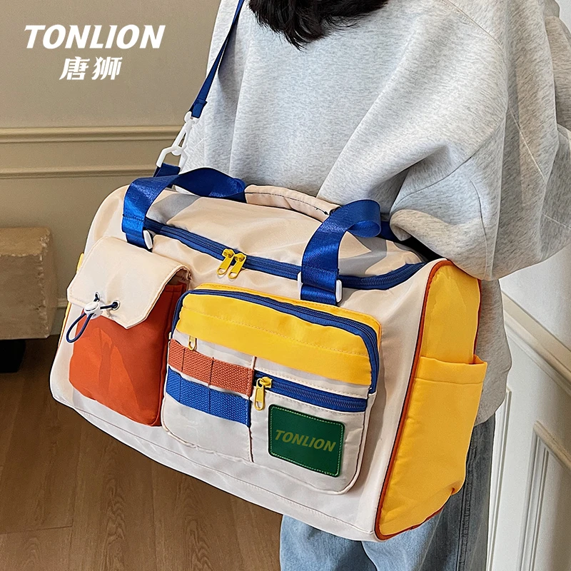 tonlion/唐狮撞色多巴胺行李包女大容量短途旅行包百搭通勤收纳包