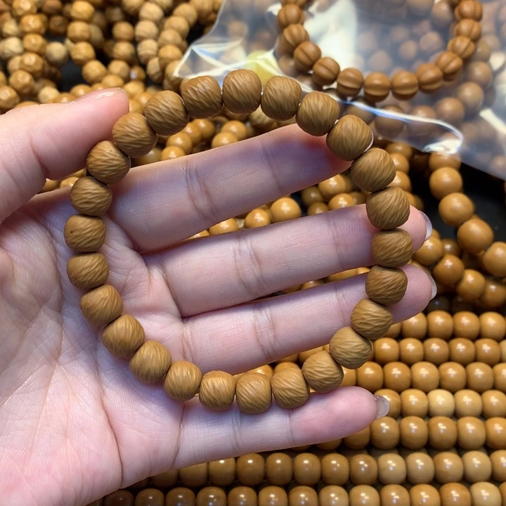 猴头核桃吊坠尘*阳微瑕拉丝云锦