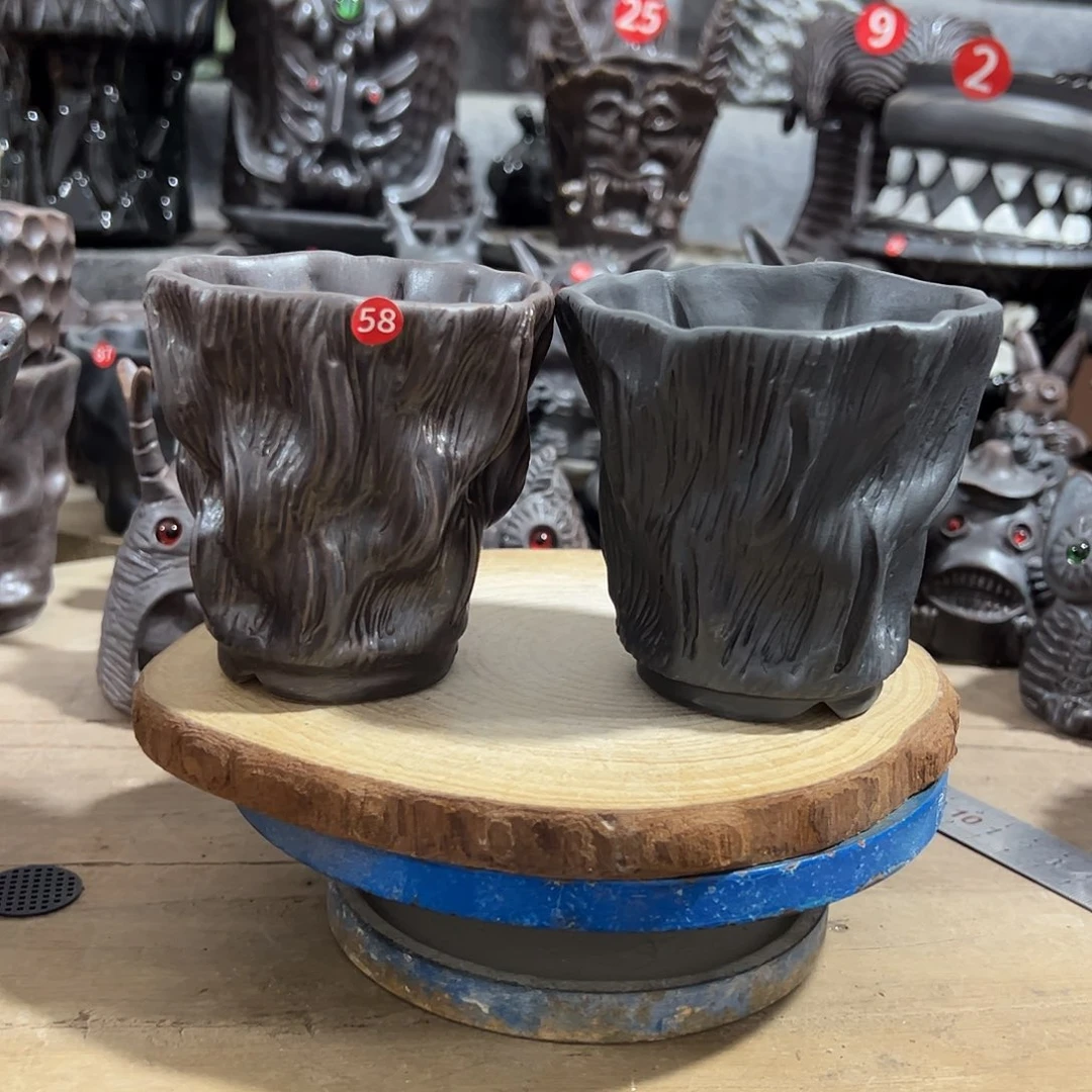 58号，手捏手刻2个，口8高9左右