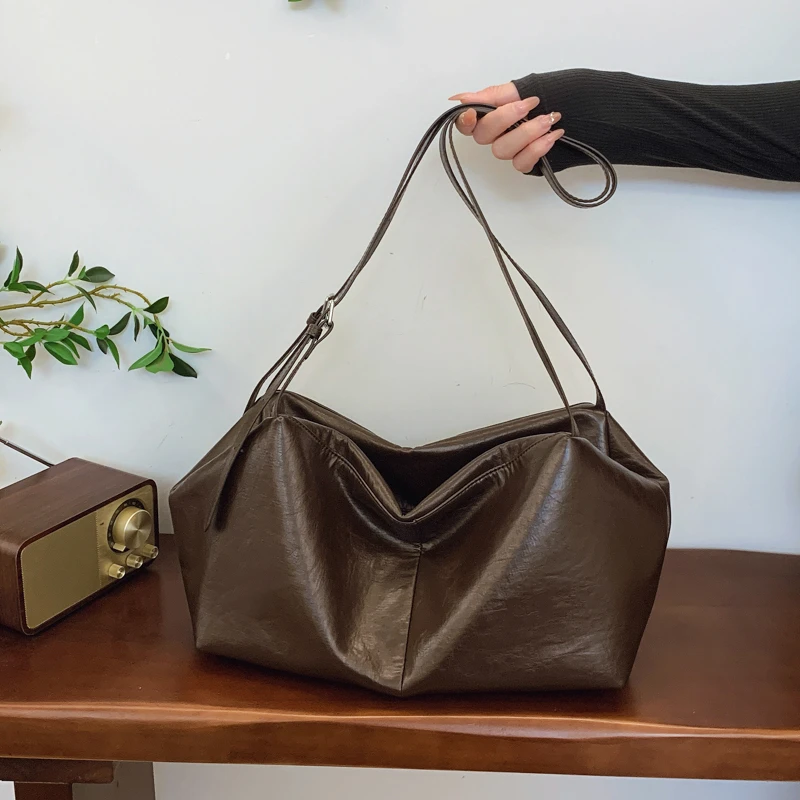 包包女2024秋冬新植鞣皮大容量托特包通勤真皮单肩斜挎包旅行包