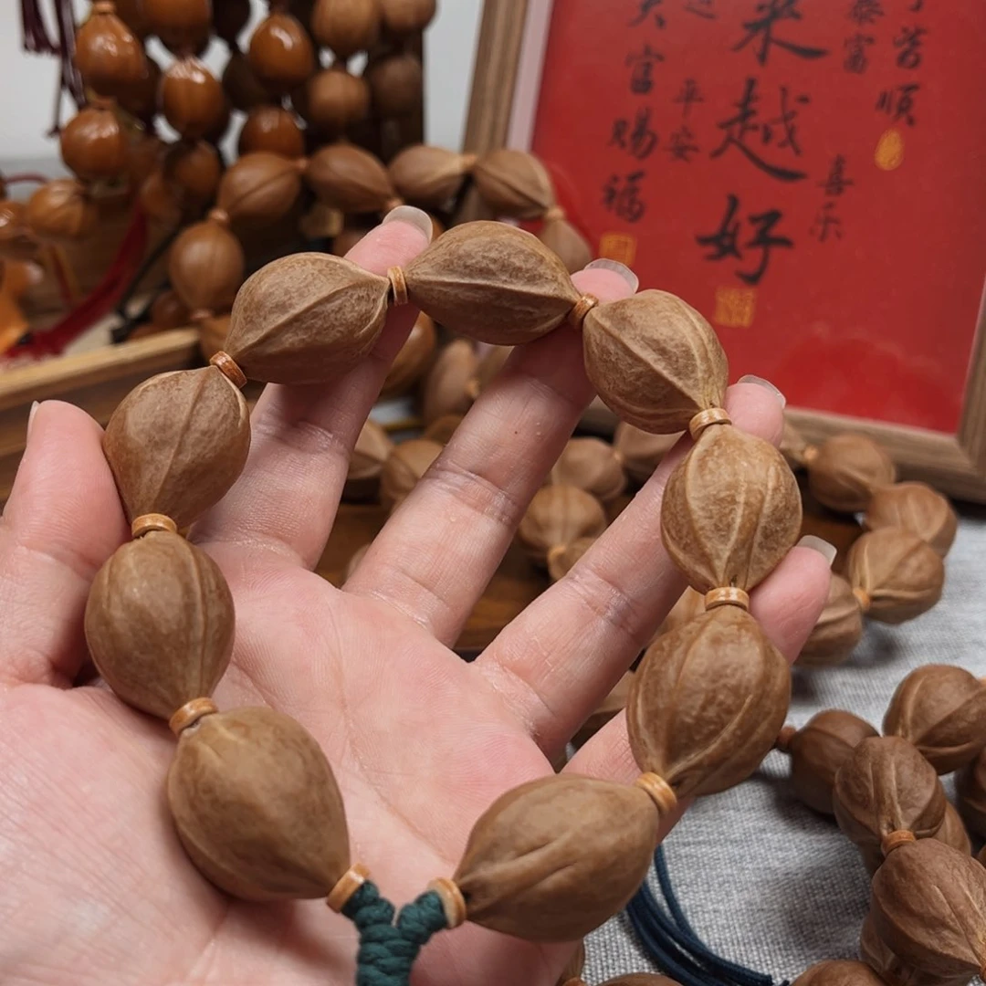 橄榄核手串刘**.梅林铁核20.29橄榄核