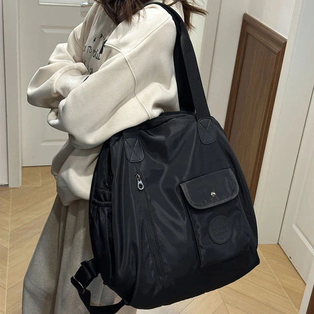 大容量双肩包女2025新款帆布旅游包轻便多功能旅行单肩背包托特包