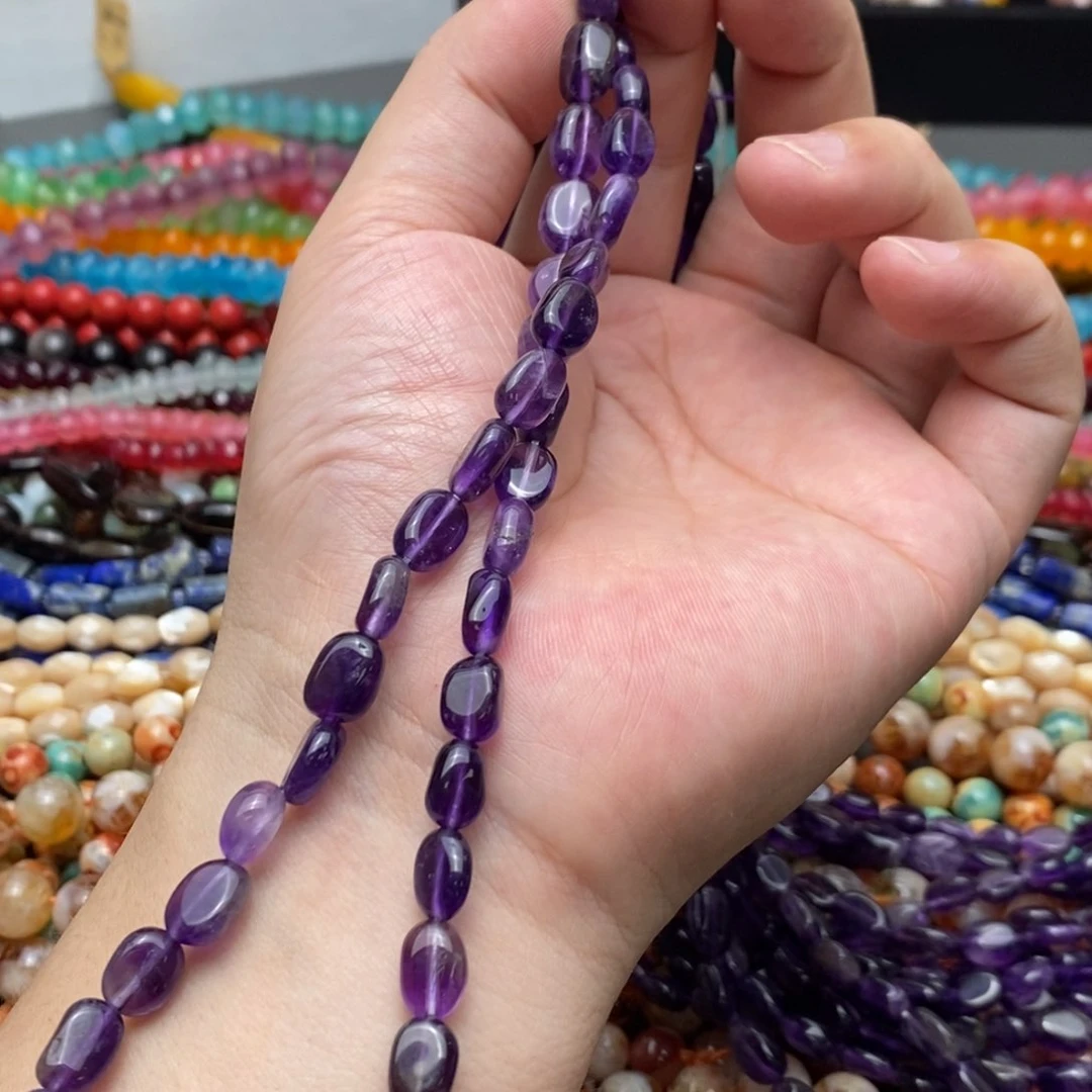 玛瑙/玉髓未镶嵌珠宝半成品紫水晶圆不定7*11mm一条