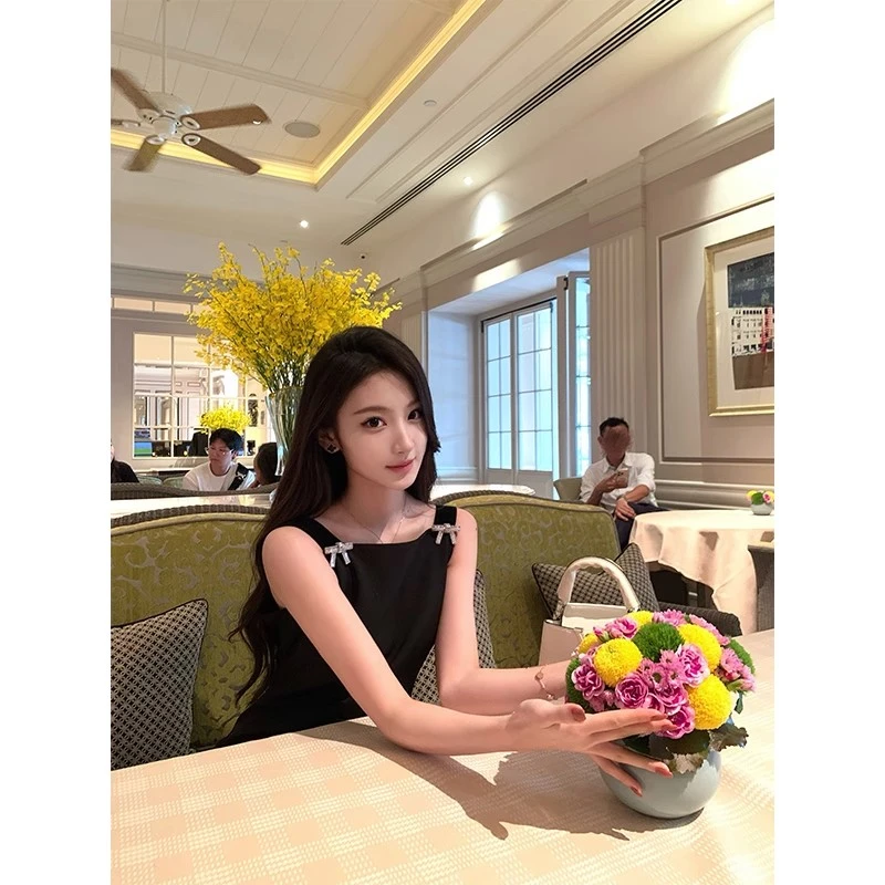 纯欲风夏季新款蝴蝶结性感辣妹黑色吊带连衣裙女露背性感裙子