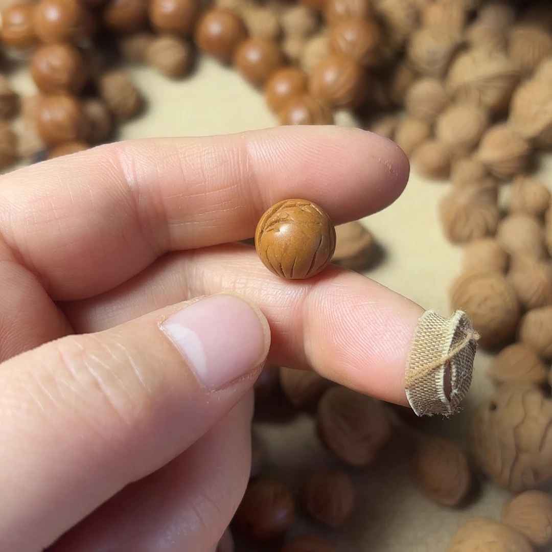 桃核吊坠畢*仙秦岭龙文光洙1.2尺20颗