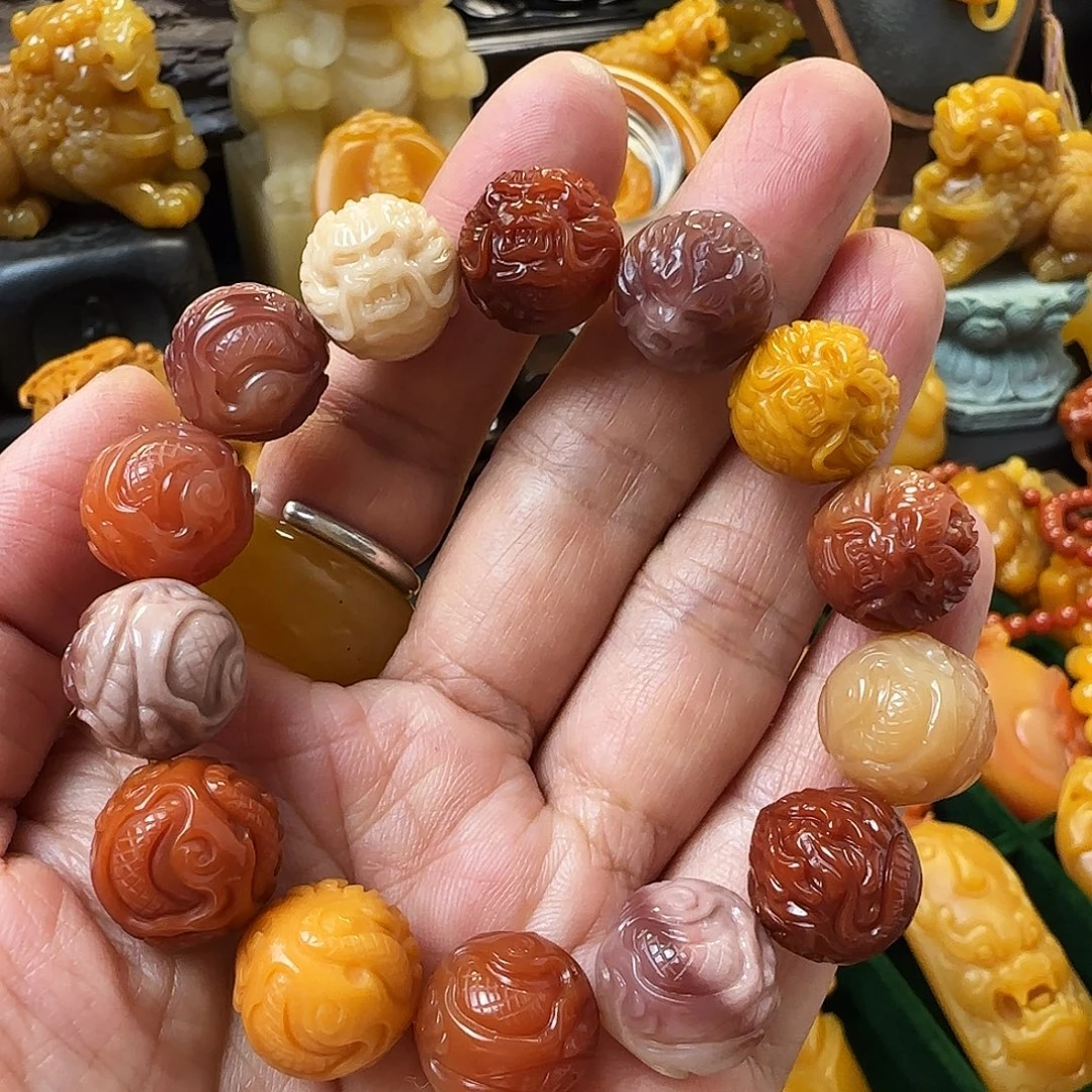 乐***遥石英质玉（缅黄）未镶嵌手串卡15雕刻龙多宝手串