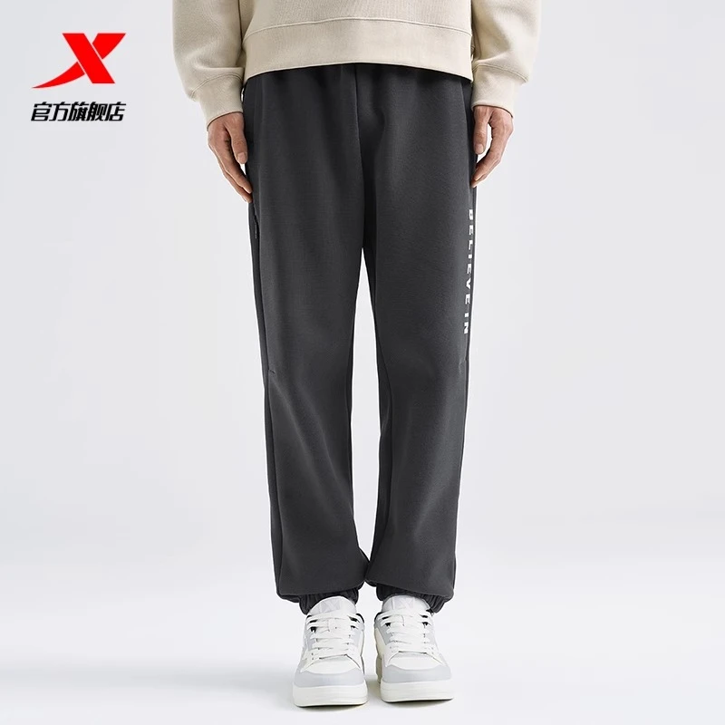 XTEP/特步休闲裤时尚百搭男裤户外跑步运动裤春季款男子针织长裤