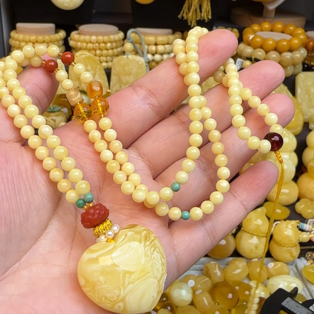 琥珀未镶嵌套链天然溶洞妖花蜜蜡爱心吊坠