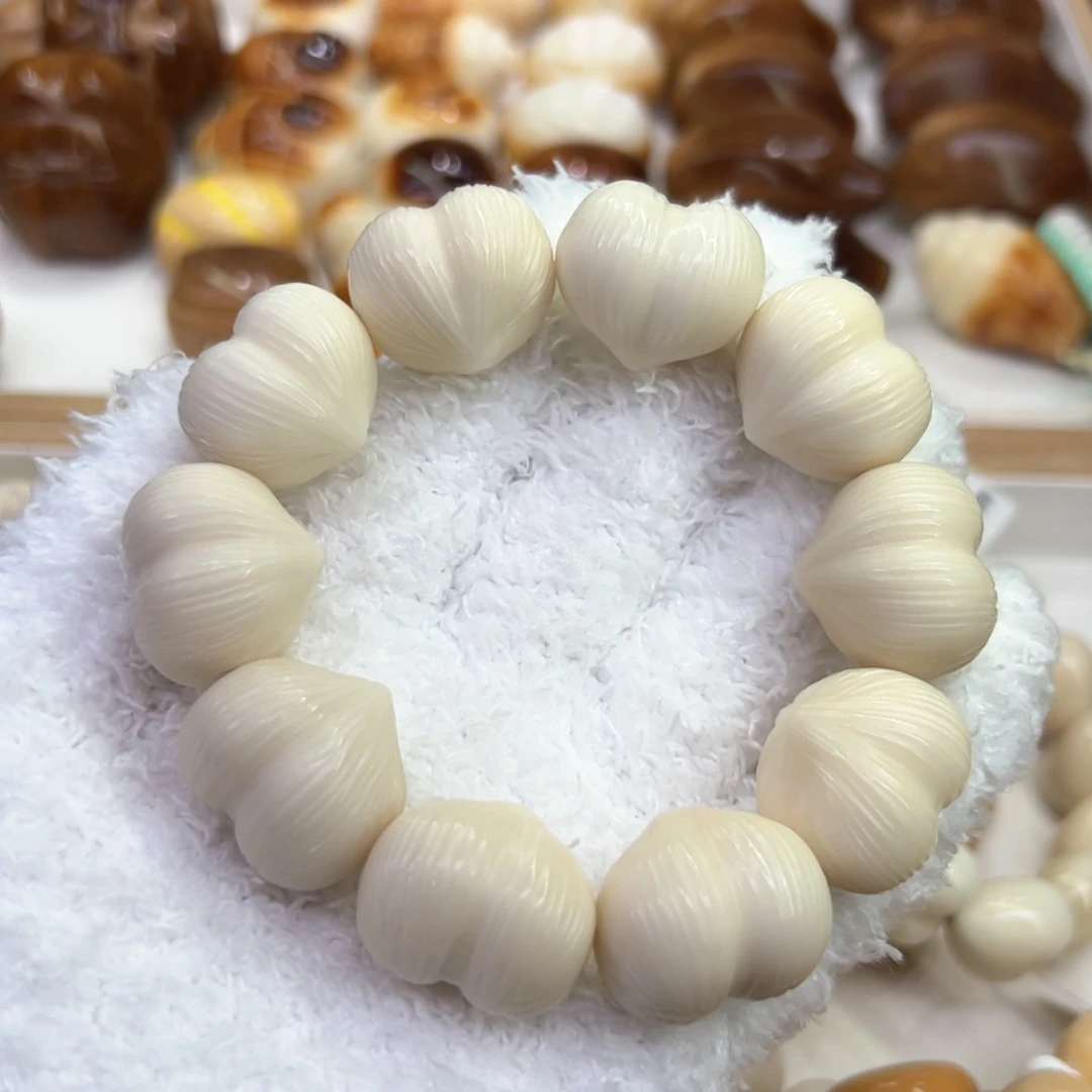 菩提根/象牙果手串61 象牙果原果雕刻原白拉丝屁桃
