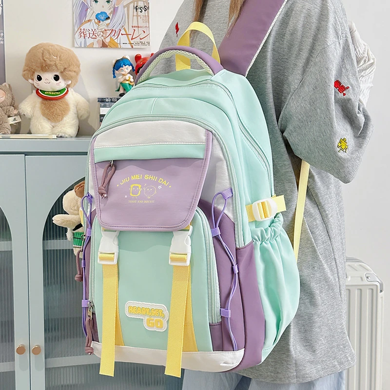 高颜值双肩包中学生书包新款撞色防水超轻大容量可爱轻便减负背包