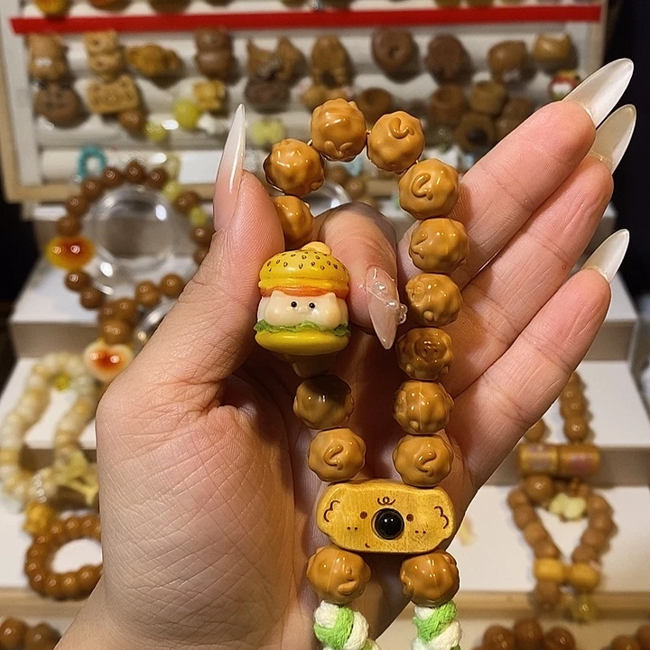 舒***@手串猴头核桃猪换过去