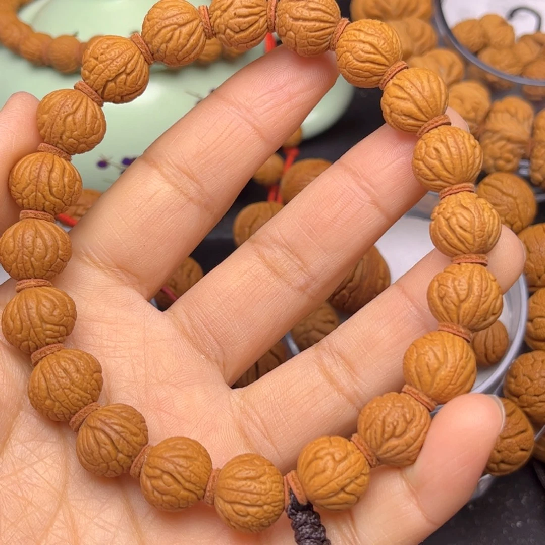 甜***子桃核吊坠龙纹桃核