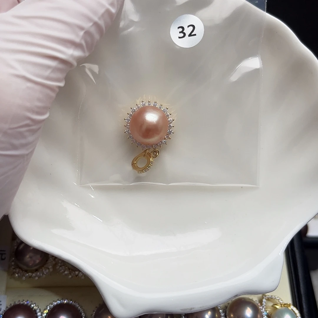 朱***绣淡水珍珠银S925镶嵌耳饰