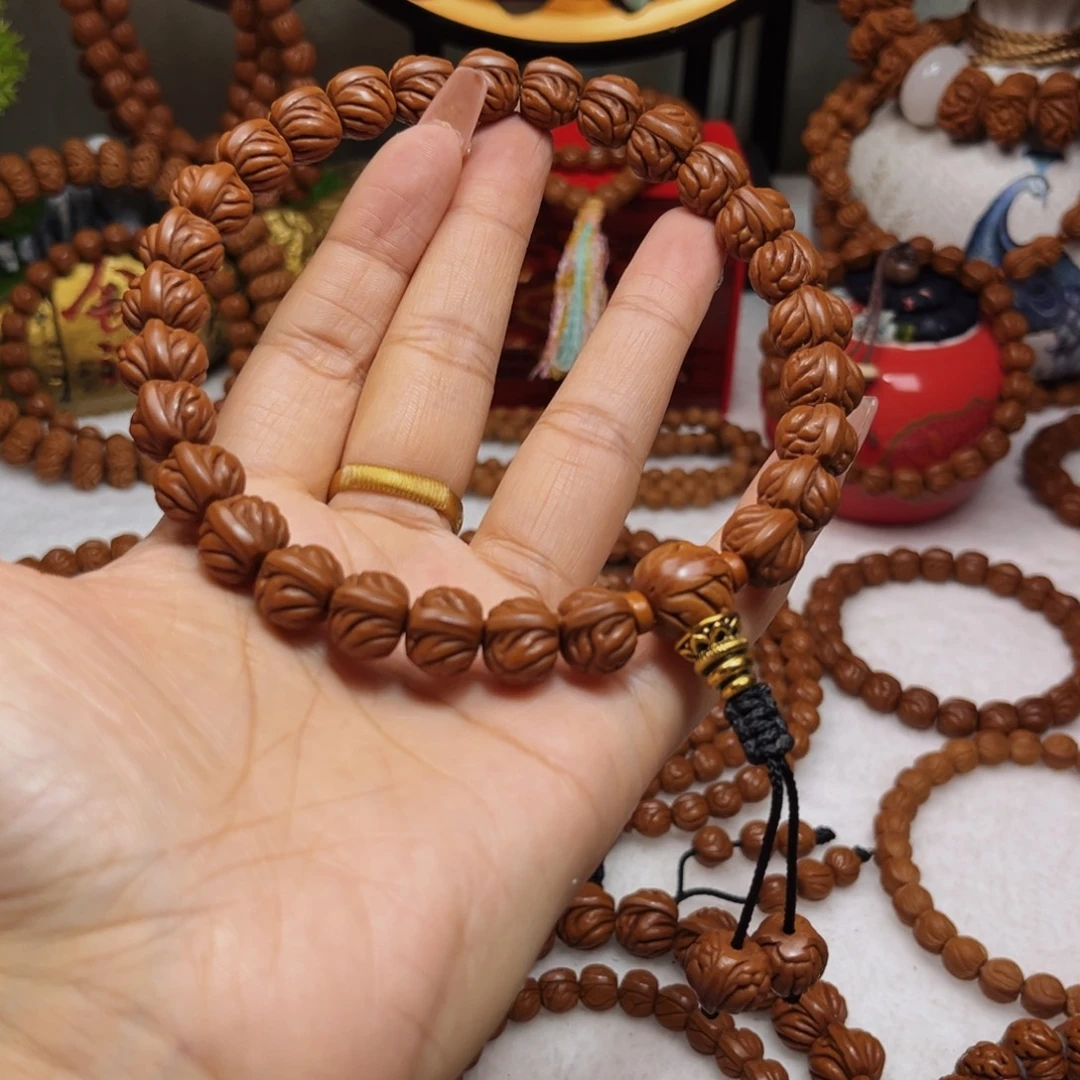 胡***杨吊坠桃核13顶级双脊龙手持