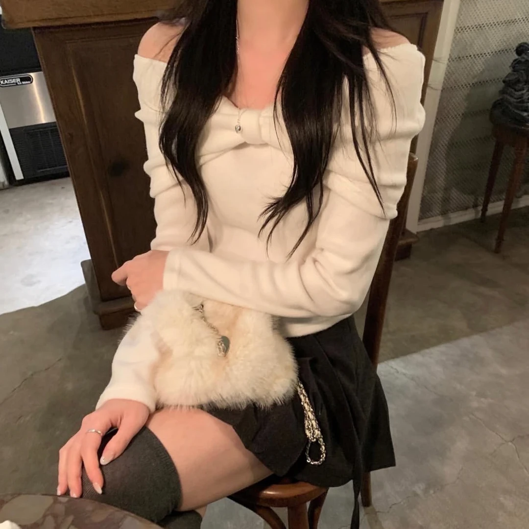 韩式chic气质2025年秋冬新款ins甜美蝴蝶结露肩百搭长袖衫女装