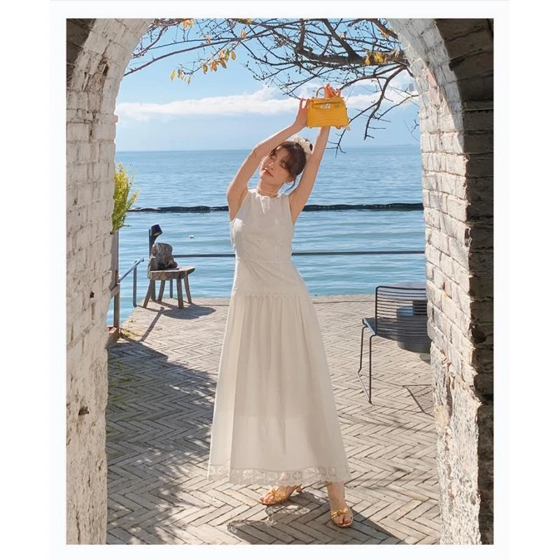 白色连衣裙女夏季2025新款镂空法式初恋度假风无袖收腰背心裙子