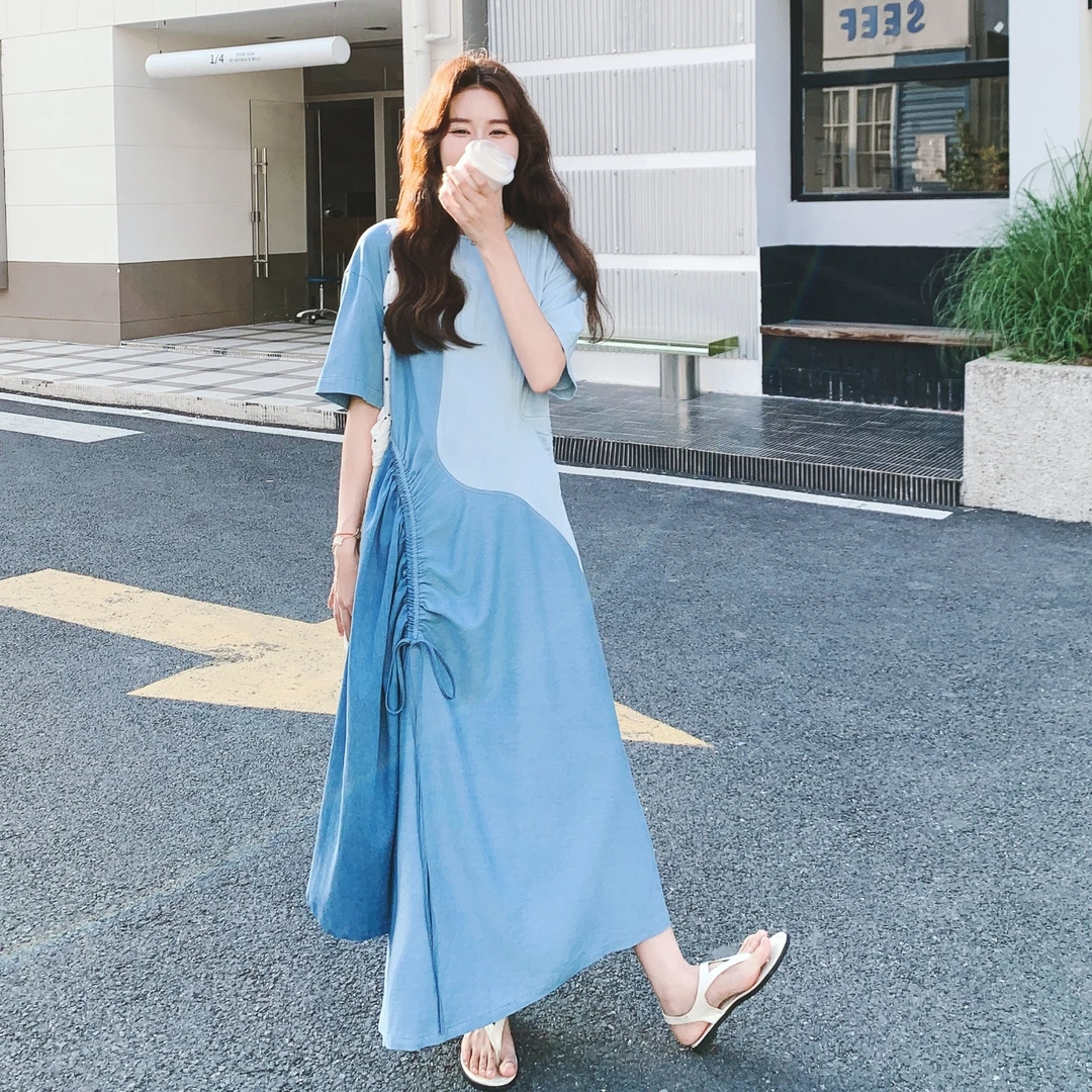 蓝色不规则牛仔拼接连衣裙女225夏季新款独特别致氛围感气质长裙