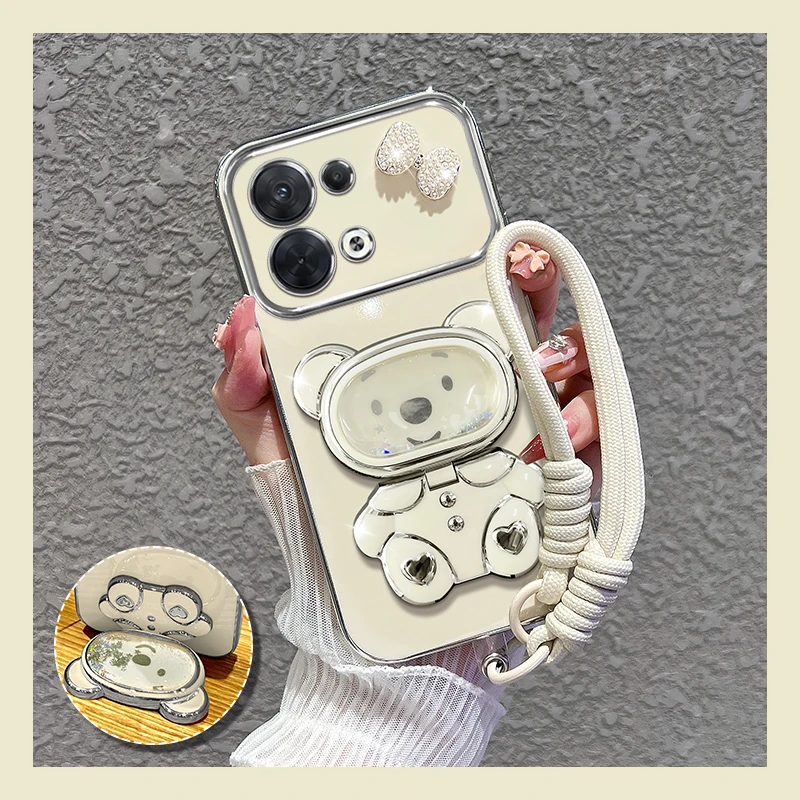 适用【opporeno9/pro/+】手机壳新款流沙熊镜子支架女蝴蝶结防摔套