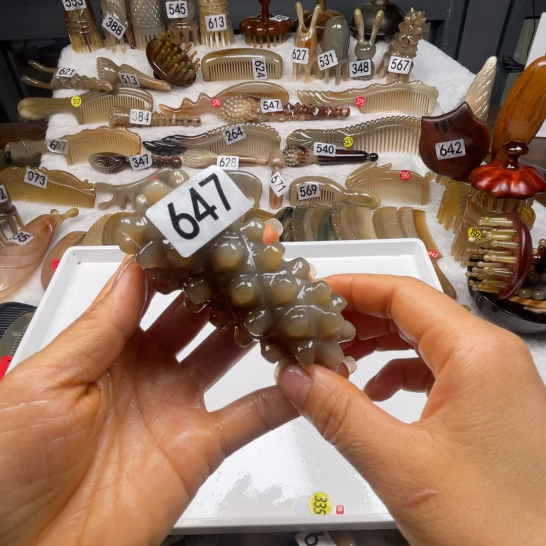 魏***年牛角梳福利款梳子