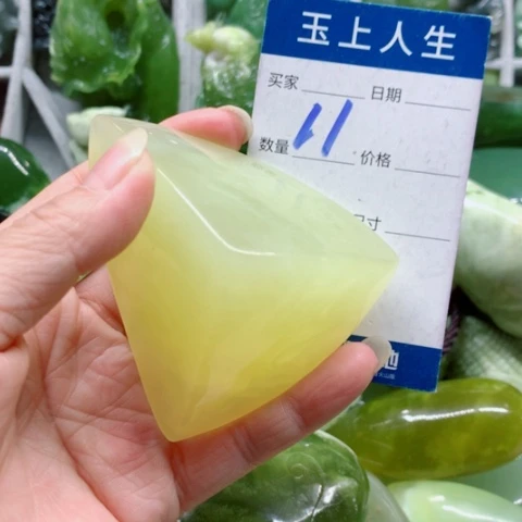 木***堂蛇纹石玉未镶嵌手把件